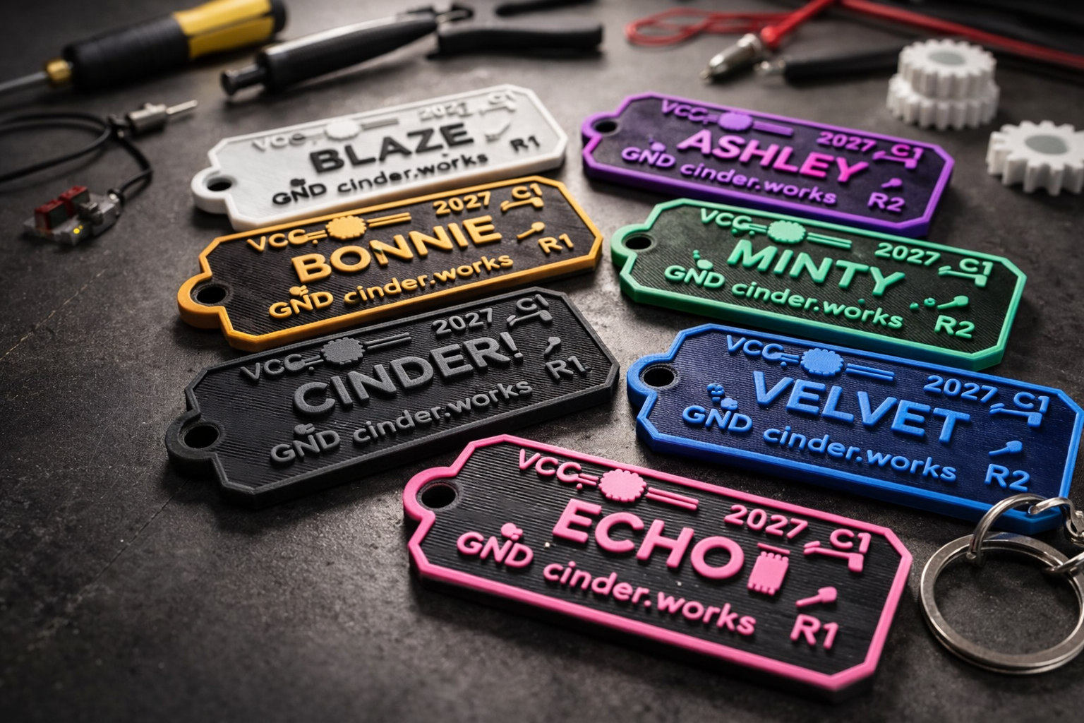 Custom PCB name keychains in multiple colors — BONNIE, BLAZE, ASHLEY, MINTY, CINDER, VELVET, ECHO — 3D printed circuit board design